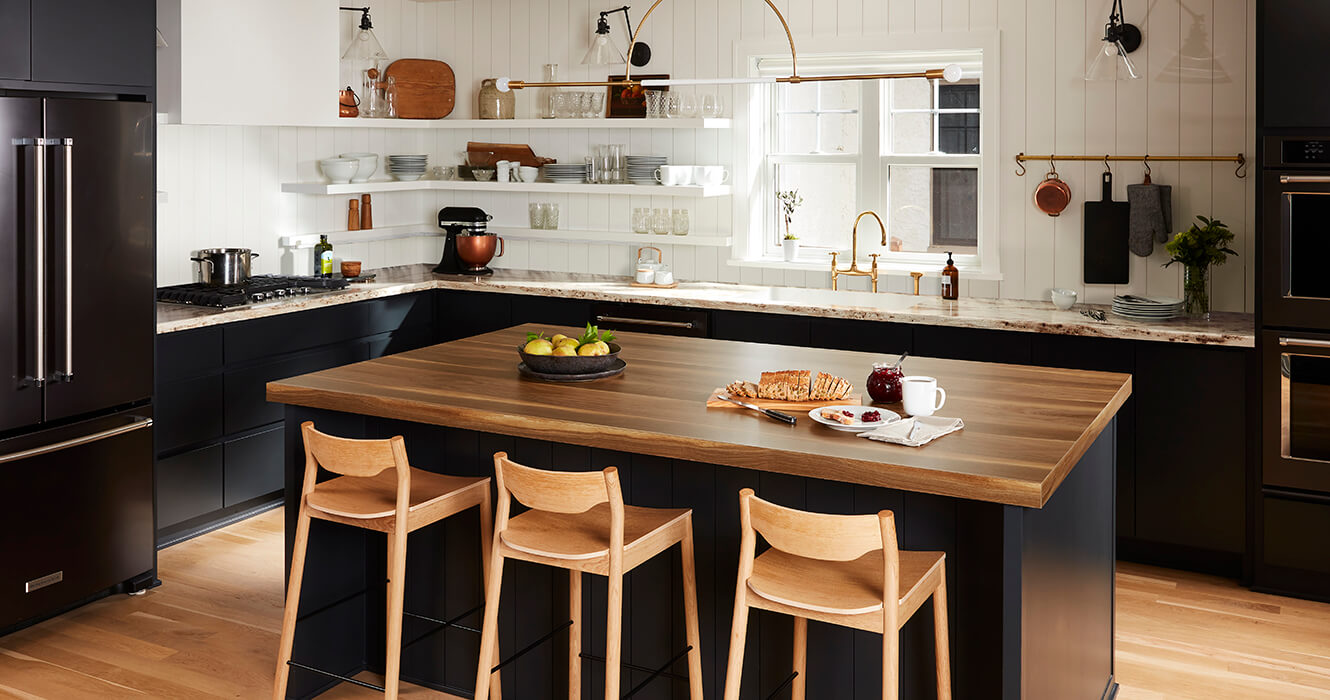 Kitchen Scene With Wide Planked Walnut And River Gold Countertops