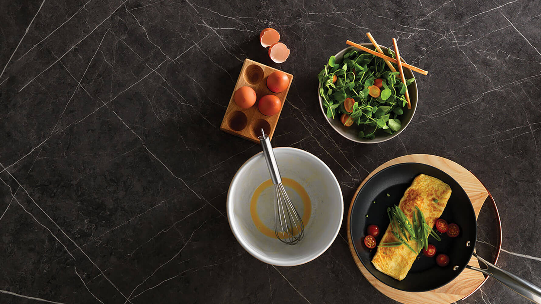 Ferro Graphite Laminate Countertop With Omelette And Omelette Ingredients